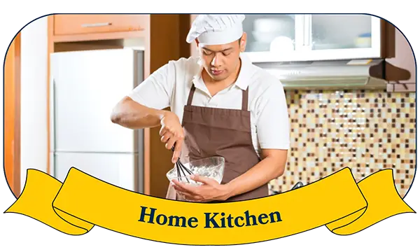 Home chef in a kitchen using Marion Kay spices and seasonings