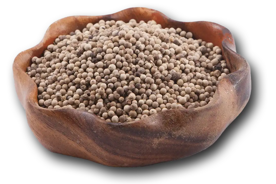 White Peppercorns in a wooden bowl